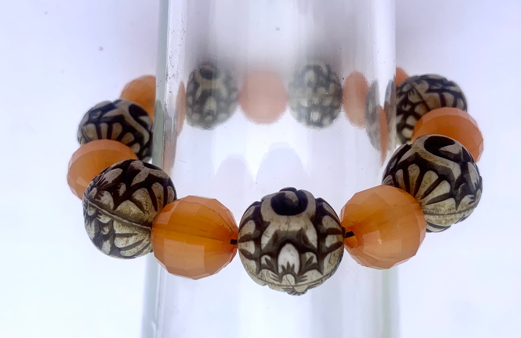 Bracelet with carved and yellow beads