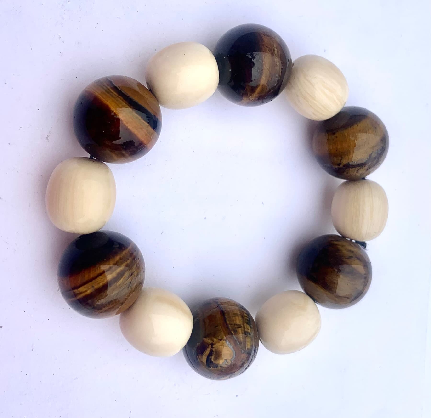 Tribal bracelet with tiger eye beads