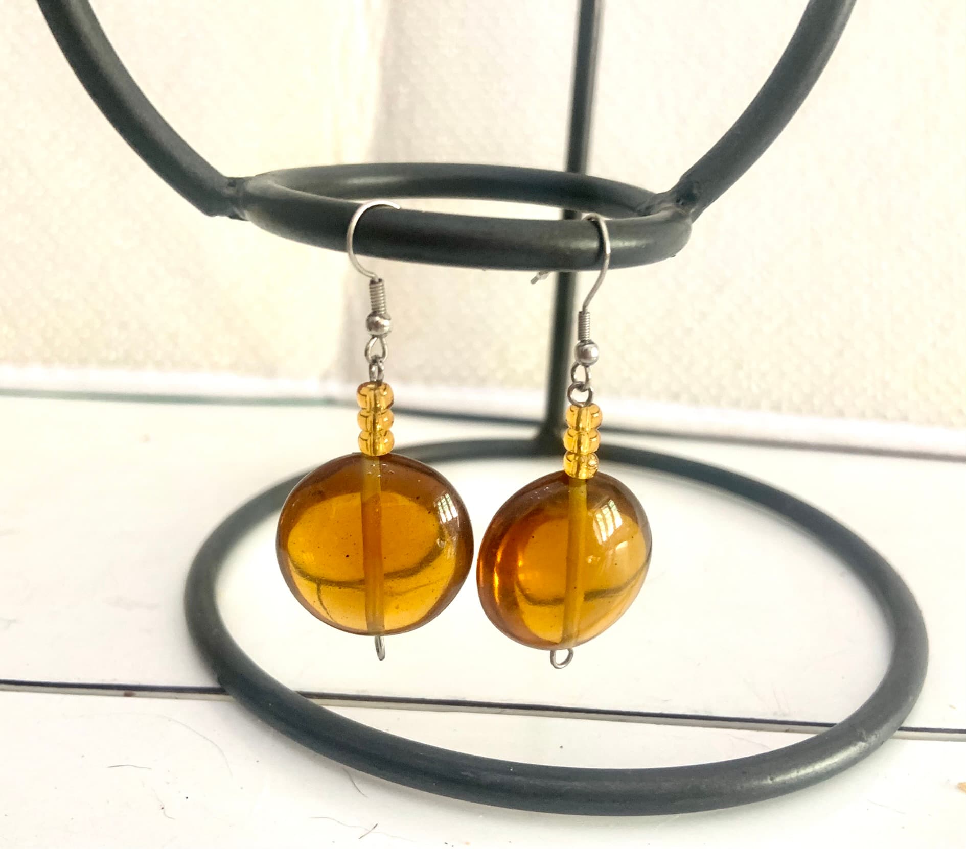 Silver Steel Earrings with Amber Tone Glass Bead 