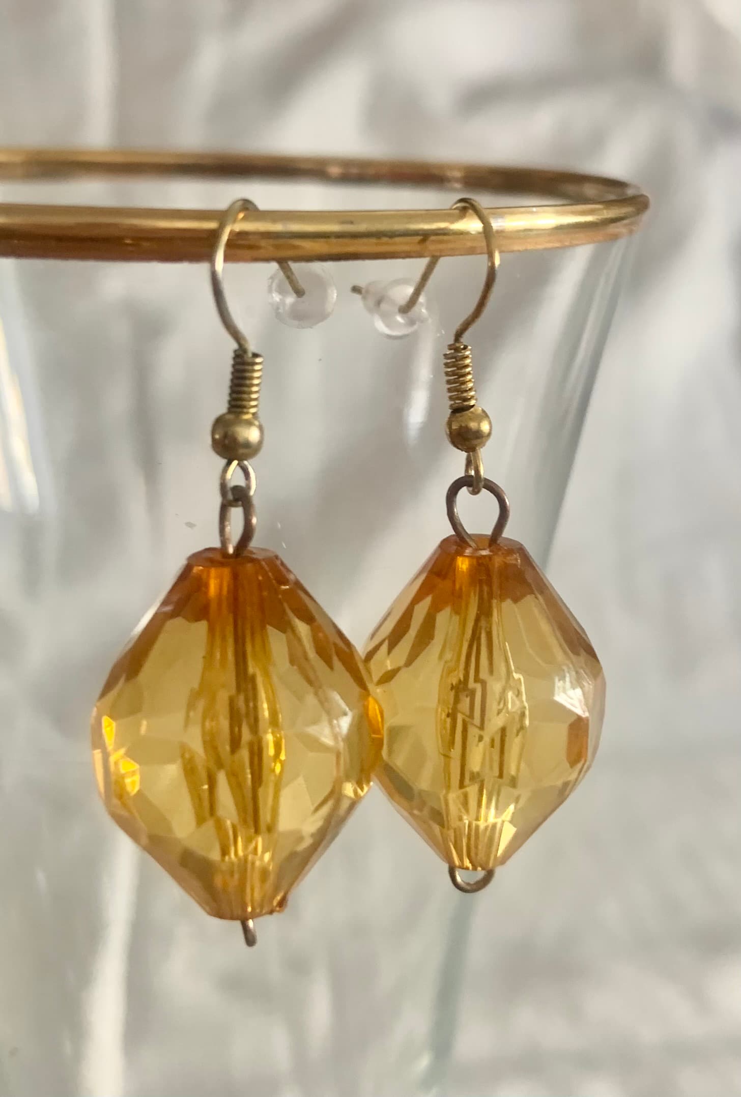 Earrings with big orange bead