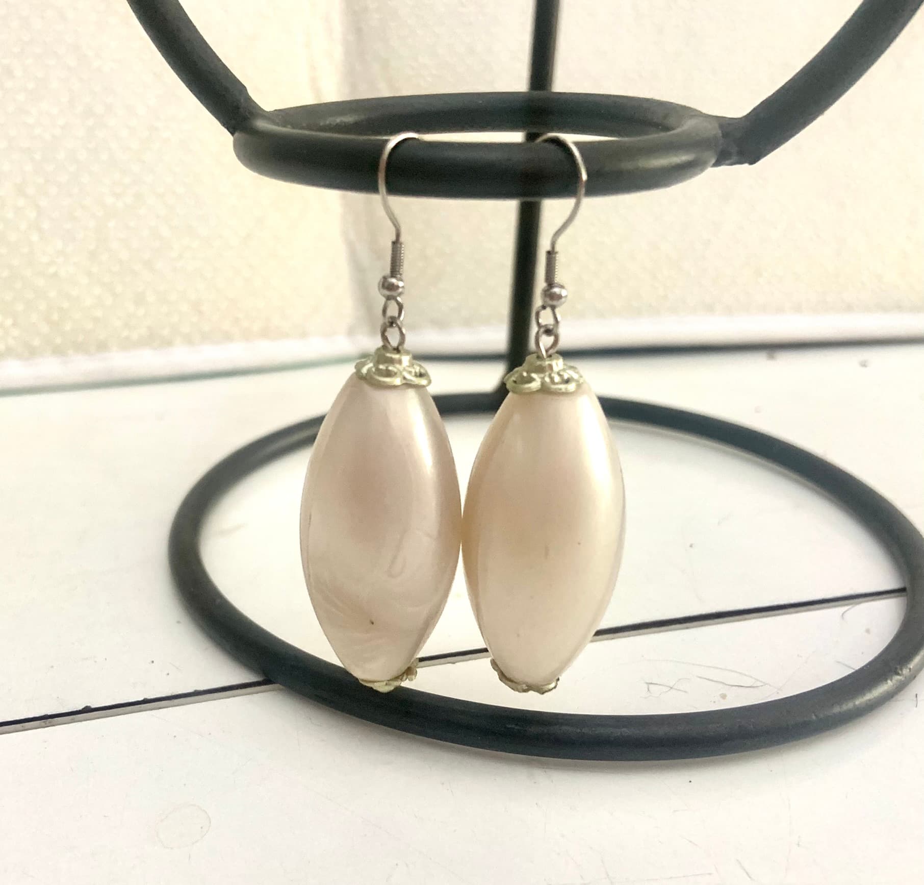 Silver steel earrings with huge Pearl Bead